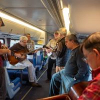 Train car jam on the Amtrak to the Great 48 Jam - photo by Patrick Campbell