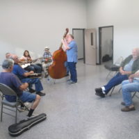 One of the many jam sessions taking place in one of the new classrooms  at the Snow Hill Bluegrass Jamboree - photo by Audie Finnell