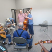One of the many jam sessions taking place in one of the new classrooms at the Snow Hill Bluegrass Jamboree - photo by Audie Finnell