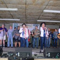 National Anthem opens the Spring 2020 Palatka Bluegrass Festival - photo © Bill Warren