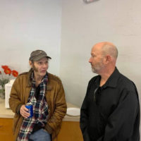 Malcolm Holcombe chats with a friend backstage at the 2nd annual Steve Sutton Memorial Concert (3/8/20)