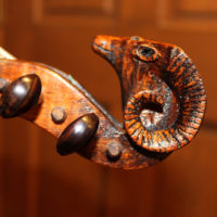 Arthur Conner ram's head fiddle scroll owned by Mike Mitchell