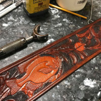 Strap carved and colored by Jason Barie