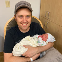 Jake Workman with his first born, Isaac