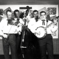 Terry Baucom on banjo with is father, Lloyd's group, The Rocky River Boys