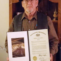 Bill Runkle with his proclamation from the Pennsylvania House of Representatives in 2017, honoring him for his long career in bluegrass.