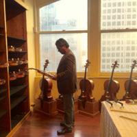 Gary Vessel contemplating the fiddle - photo by Dave Berry