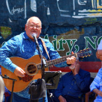 Eddie Marrs performs at the dedication of The Easter Brothers mural in Mt Airy, NC (5/15/21) - photo by Robbie Curlee