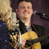 Zack Arnold with Rhonda Vincent at the Spring 2021 Gettysburg Bluegrass Festival - photo by Frank Baker