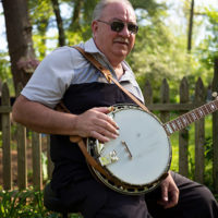 Kevin Church on banjo with Bob Perilla & Big Hillbilly Bluegrass at a house concert in Tacoma Park, MD (May 1, 2021) - photo by Jeromie Stephens