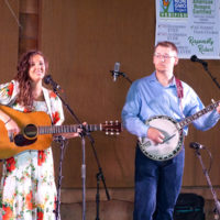 Bluegrass couple, Caroline Owens and Curt Love, at the 2021 Doyle Lawson & Quicksilver festival - photo by Sandy Hatley