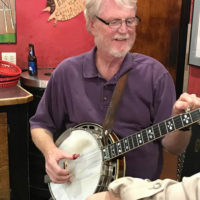 Tommy Edwards teaching banjo