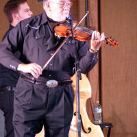 Johnny Ridge with The Malpass Brothers at the 2021 Doyle Lawson & Quicksilver Bluegrass Festival (May 7, 2021) - photo by Sandy Hatley