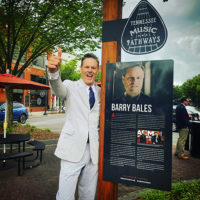 Barry Bales gives a big thumbs up at the unveiling of his Tennessee Music Pathways marker in Kingsport