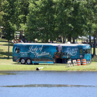 Lorraine Jordan's bus had a prominent spot at the 2021 Willow Oak Park Bluegrass Festival - photo by Laura Ridge