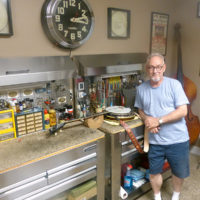 Charlie Cushman in his banjo set up shop (July 2021) - photo by Sandy Hatley