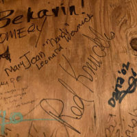 Signatures and messages on the Charles Sawtelle Memorial Bench