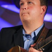 Zack Arnold with Rhonda Vincent at the Summer 2021 Gettysburg Bluegrass Festival - photo by Frank Baker