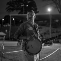 Andy Lowe, Apex, NC, watching the banjo competition at the 85th Old Fiddlers Convention, Galax, VA - photo by Jeromie Stephens