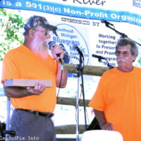 Bill Luzier announces winners at the 2021 Blissfield Bluegrass on the River (8/14/21) - photo © Bill Warren