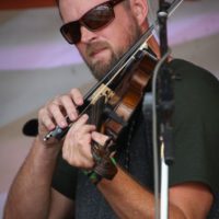 Tim Gardner with Unspoken Tradition at the Summer 2021 Gettysburg Bluegrass Festival - photo by Frank Baker