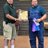 Billy Hurt accepts best all around plaque at the 2021 Old Fiddlers Convention - photo by Donald Trausneck