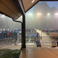 It's not Galax if it doesn't rain at the 2021 Old Fiddlers Convention - photo by Donald Trausneck