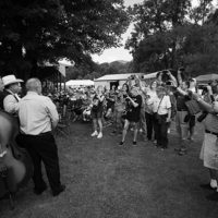 Fans and photographers line up for the Junior Sisk Band at the 2021 Pickin' in Parsons festival - photo by Jeromie Stephens