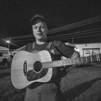 Caleb Duke Erickson is ready to pick at the Old Fiddlers Convention in Galax, VA (August 10, 2021) - photo by Jeromie Stephens