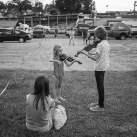 Future fiddlers at the Old Fiddlers Convention in Galax, VA (August 10, 2021) - photo by Jeromie Stephens