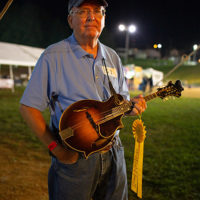 Mandolin competitor Tim Martin of Yadkinville, NC with his participation ribbon at the Old Fiddlers Convention in Galax, VA (August 10, 2021) - photo by Jeromie Stephens