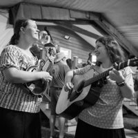 Libby and Lucy Lindbloom of the Headin’ Home bluegrass band, Savannah, GA ready for the mandolin competition at the Old Fiddlers Convention in Galax, VA (August 10, 2021) - photo by Jeromie Stephens