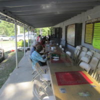 Attendees enjoying their meals "alfresco" since no congregating was allowed in the closed-space cafeteria at the Labor Day 2021 Armuchee Bluegrass Festival