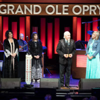 Joe Isaacs joins The Isaacs at their induction as members of the Grand Ole Opry (9/14/21) © Grand Ole Opry/photo by Chris Hollo