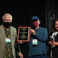 Stan Zdonik accepts his Distinguished Achievement award from Ken Irwin and Marion Leighton-Levy at the IBMA Industry Awards - photo © Bill Reaves