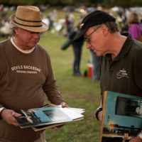 Sharing a common love for vinyl records and the Selcom Scene, here two fans compare their LP's.  Mount Airy Farm, Warsaw, VA Saturday September 25th, 2021 - photo by Jeromie Stephens