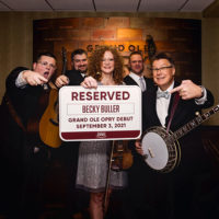 Becky Buller Band celebrates with their parking sign at the Grand Ole Opry (9/3/21) - photo by Shelly Swanger