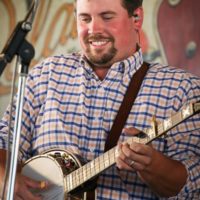 Trent Callicutt with Kenny & Amanda Smith at the 2021 Delaware Valley Bluegrass Festival - photo by Frank Baker