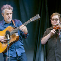 Bryan Sutton and Michael Cleveland with Béla Fleck's My Bluegrass Heart at FreshGrass 2021 - photo © Dave Hollender