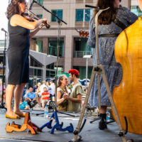 Dancing to the Berea College Bluegrass Band at the 2021 IBMA Bluegrass Live! Streetfest - photo © Tara Linhardt