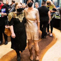 Hasee Ciaccio and a friend's mask fashion at the 2021 IBMA Bluegrass Music Awards - photo © Tara Linhardt