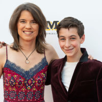 Kristin Scott Benson and her son, Hogan, on the red carpet at the 2021 IBMA Bluegrass Music Awards - photo © Bill Reaves