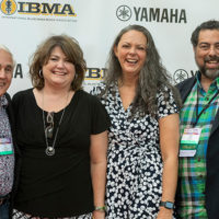 Greg Blake (right) with family and friends on the red carpet at the 2021 IBMA Bluegrass Music Awards - photo © Bill Reaves