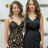 Leanna Price and Lauren Price Napier on the red carpet at the 2021 IBMA Bluegrass Music Awards - photo © Bill Reaves