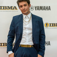 Tristan Scroggins on the red carpet at the 2021 IBMA Bluegrass Music Awards - photo © Bill Reaves