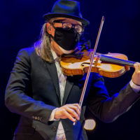 Masked fiddler Nicky Sanders at the 2021 IBMA Bluegrass Live! - photo © Bill Reaves