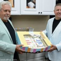 Ben Greene and Kevin Lamm with their cake at the Carolina Road CD release party (10/1/21) - photo © Bill Warren