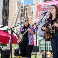 Marcy Marxer & Cathy Fink with Eliza Meyer at the 2021 IBMA Bluegrass Live! Streetfest - photo © Tara Linhardt