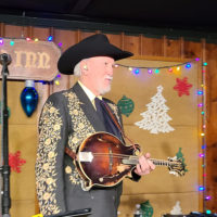 Doyle Lawson at The Station Inn with his Bill Monroe Hall of Fame Gibson F5 mandolin, given to him by David Harvey with Gibson (11/27/21) - photo by Styx Hicks