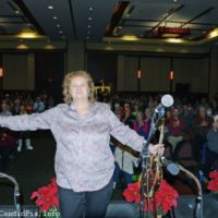 Lorraine Jordan poses with the audience at Bluegrass Christmas in the Smokies - photo © Bill Warren